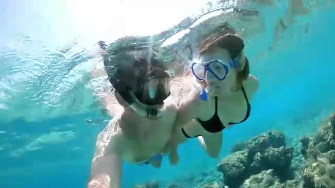 MS夫妇与可穿戴相机在马尔代夫的热带海洋浮潜