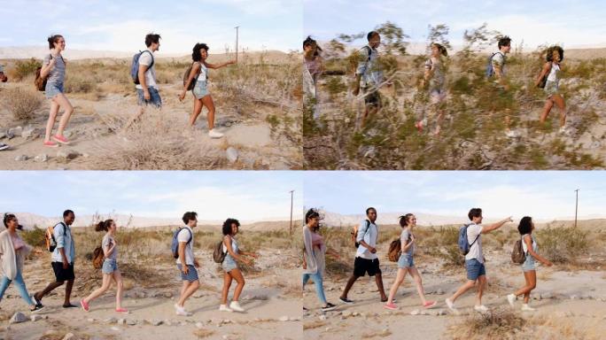 五名年轻人在棕榈泉沙漠徒步旅行，侧视图