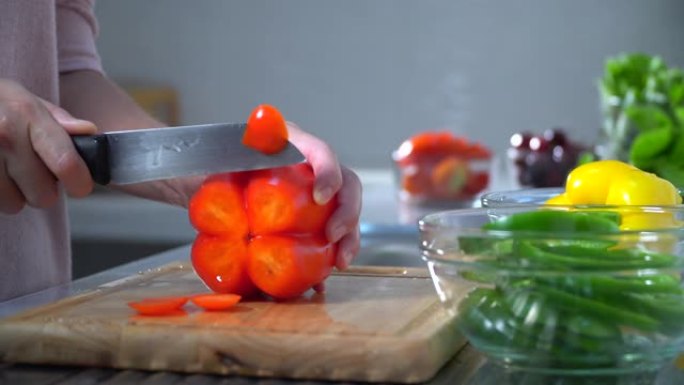 吃蔬菜的胖女人做饭辣椒红辣椒