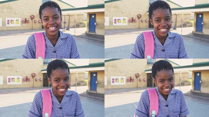 一个年轻女学生在操场上微笑的肖像4k