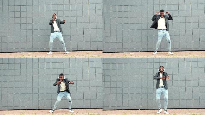 快乐的非洲裔美国人在户外戴着耳机跳舞的慢动作