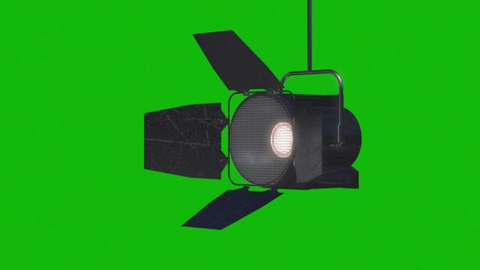 绿色屏幕上带有反射器动画的专业舞台灯，照明设备的设计元素，带有镜头耀斑的移动和转动工作室电影聚光灯投