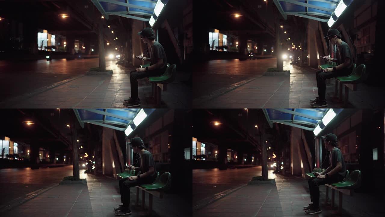 晚上独自一人在公交车站等候避难所的男人