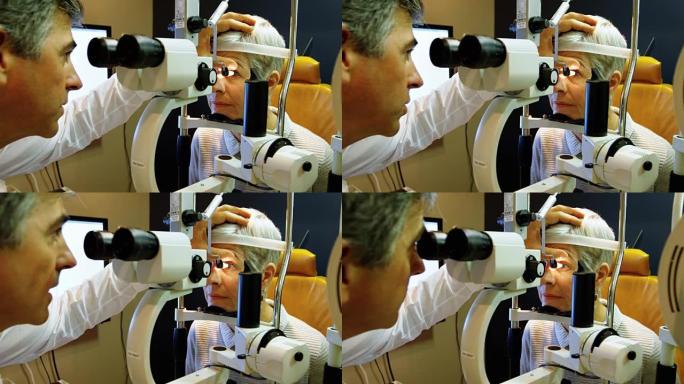 验光师用裂隙灯4k检查患者的眼睛