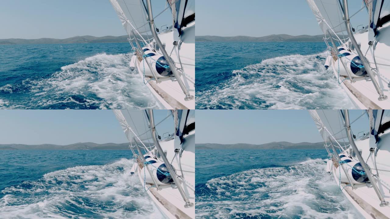 MS慢动作帆船在克罗地亚阳光明媚的蓝色海洋上航行