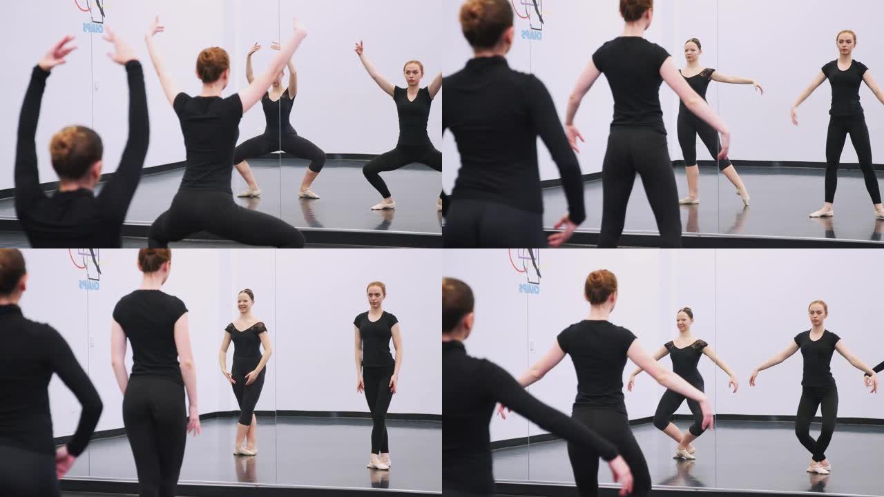 表演艺术学校的女学生在舞蹈工作室排练芭蕾舞，反映在镜子中