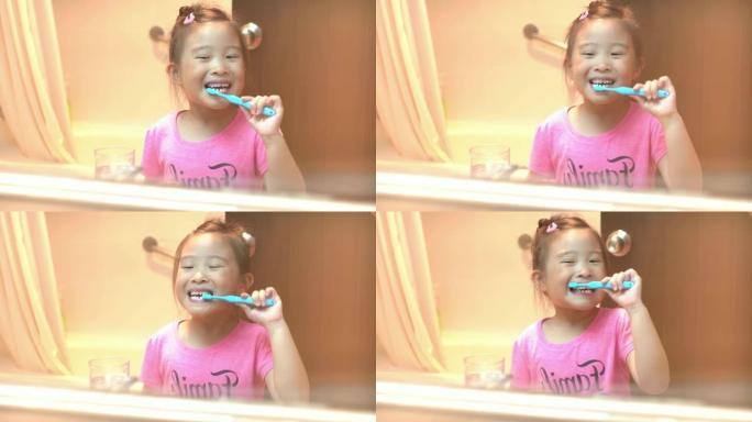 快乐的小女孩在浴室刷牙