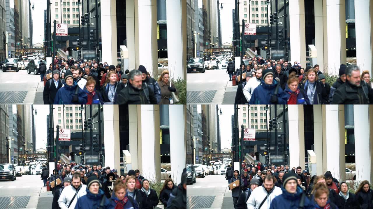 4k慢动作镜头在美国伊利诺伊州芝加哥的现代建筑中的高峰时段，行人在街上行走，商业和美国文化概念