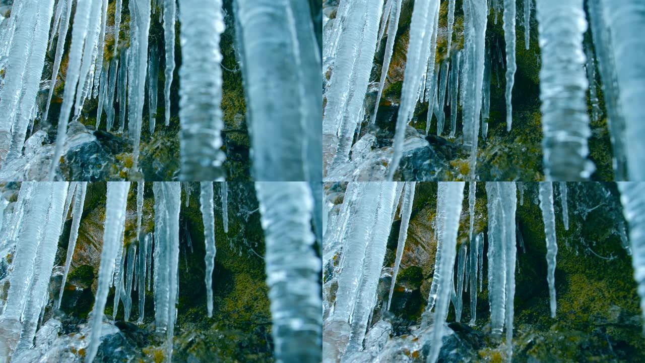 岩石上的冰柱冰溜茬子石洞内的冰雕