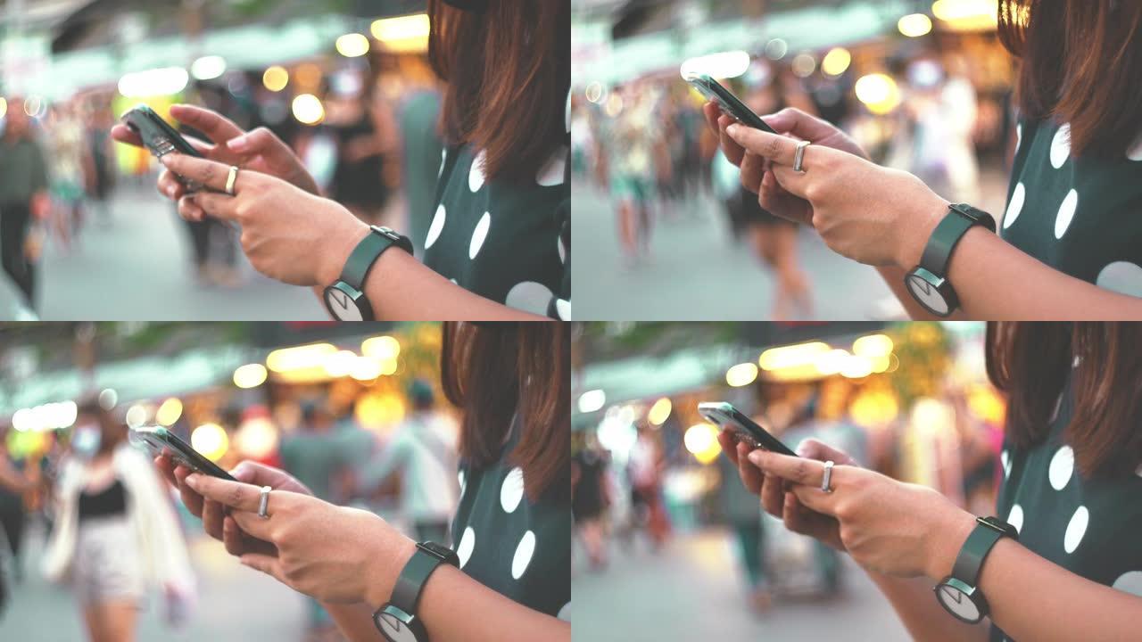 亚洲女性使用电话玩手机看手机视频素材