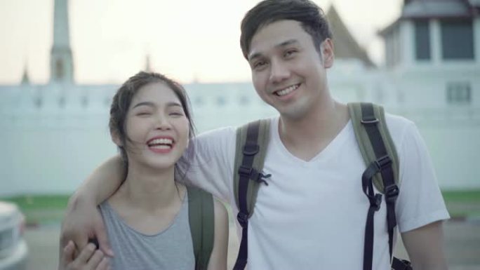 4k分辨率快乐亚洲情侣旅行者在泰国对着镜头说话