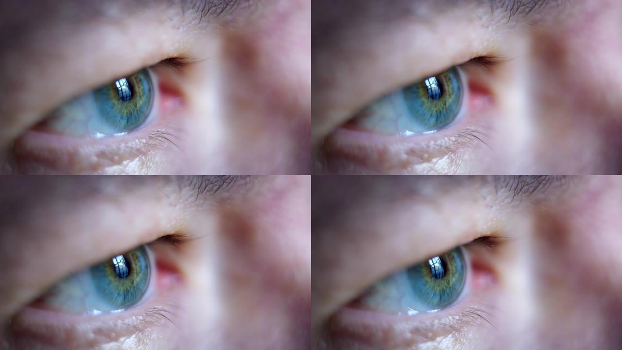 中年男性蓝眼慢动作闪烁的特写微距镜头。