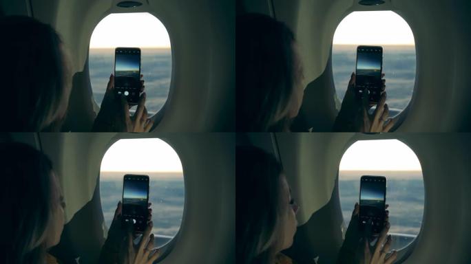 在飞机上拍照时，女人手中的手机