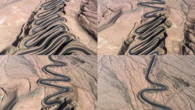 新疆鸟瞰图航拍新疆沙漠公路汽车越野行驶戈