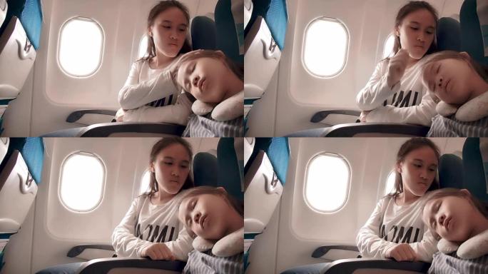 SLO MO旅行儿童女孩睡在飞机上