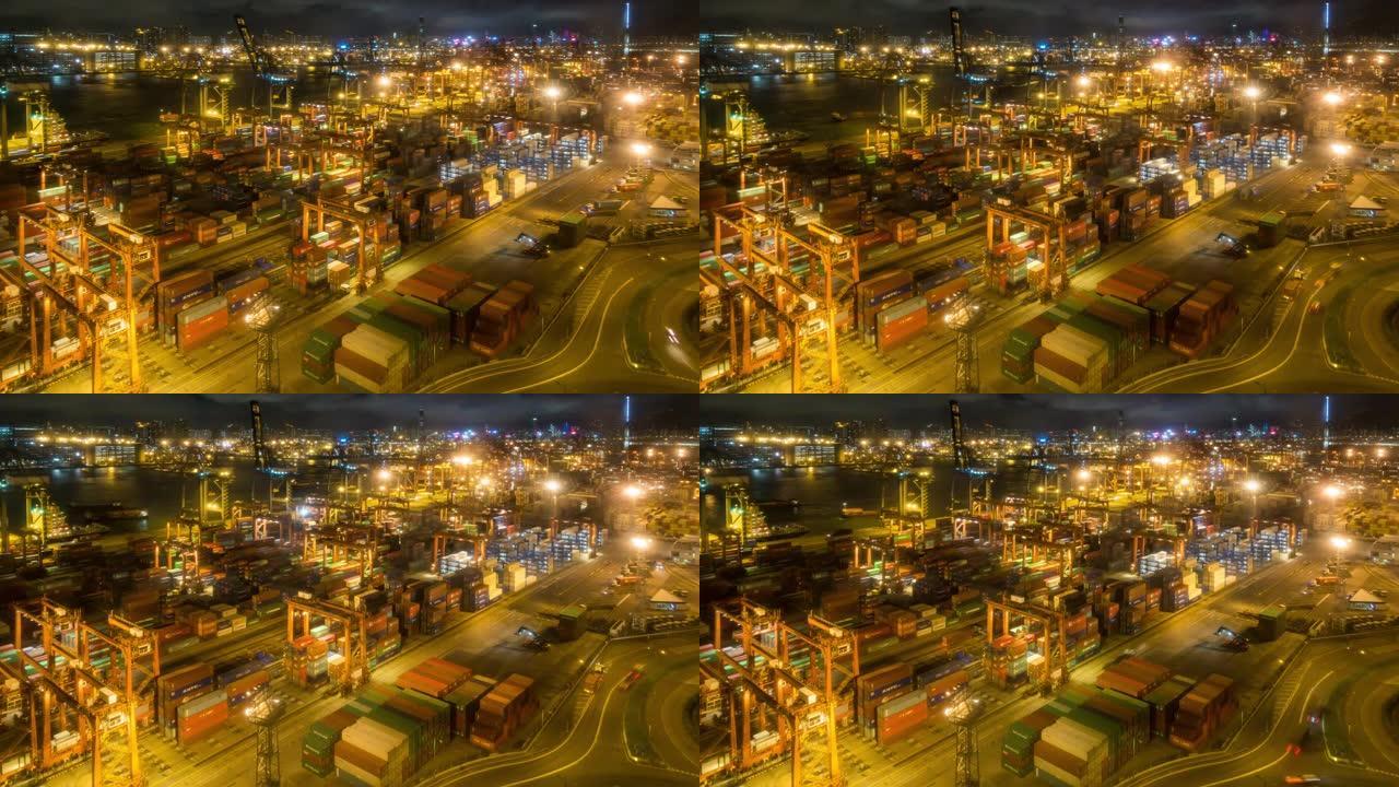 延时: 鸟瞰图货船在香港青衣港装卸港口，晚上以香港城市景观为背景