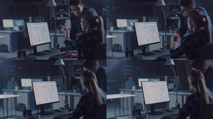 在台式计算机上工作的工程师，屏幕上显示带有技术蓝图的cad软件，她的男项目经理解释了工作细节。工业设