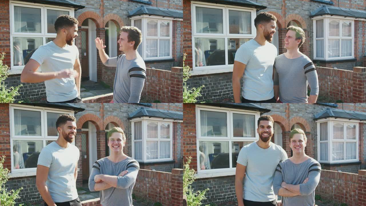两名男子站在新家外面互相击掌的肖像