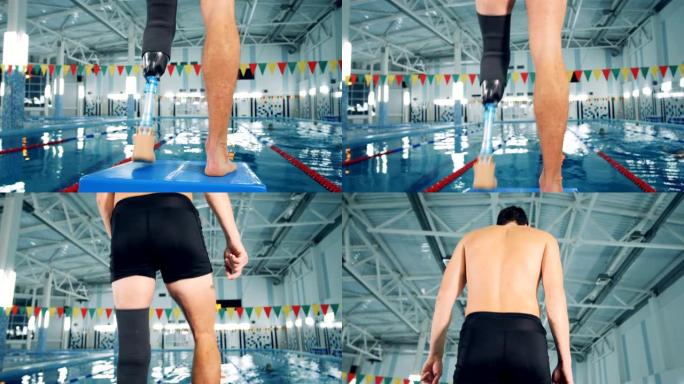 游泳者在游泳池附近进行假肢训练，仿生设备。