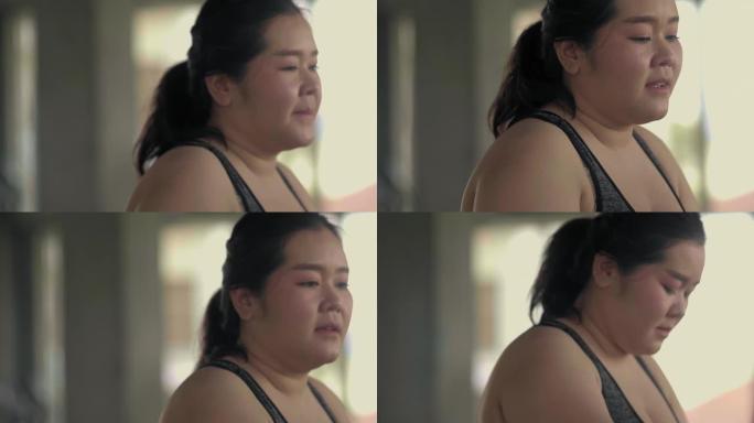 亚洲女性在跑步机上行走，特写镜头