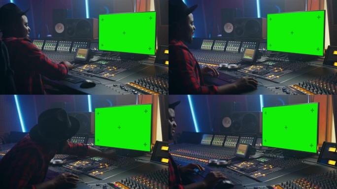 在音乐唱片工作室工作的时尚音频制作人的肖像，使用绿屏计算机，调音台，控制台来创作新歌。富有创造力的黑