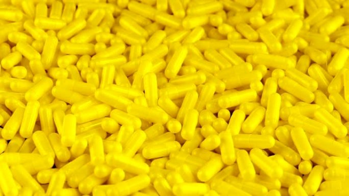 黄色药物胶囊-医学概念