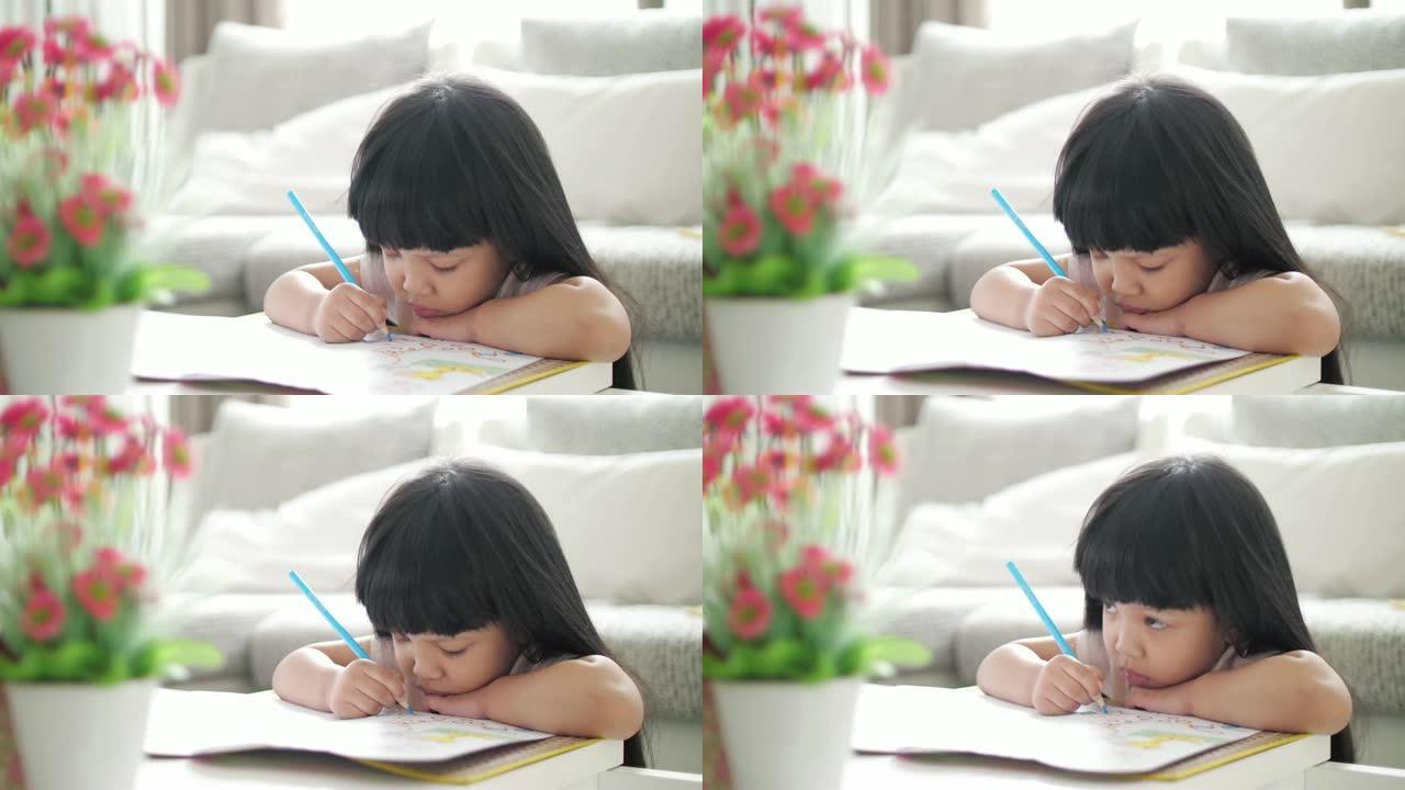小女孩在假期在家写画和画画，慢动作