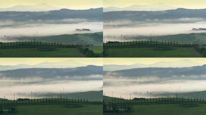 托斯卡纳乡村，晨雾中有起伏的丘陵。意大利瓦尔多尔西亚皮恩扎。平移镜头
