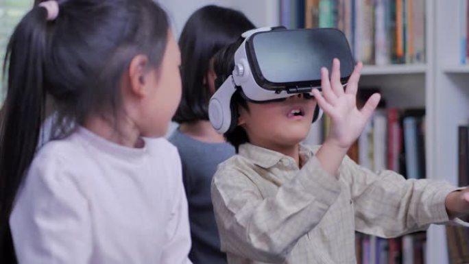 小学生在课堂上使用虚拟现实模拟器眼镜。教育，儿童，技术，科学和人的概念。回到学校。STEM中的女性。