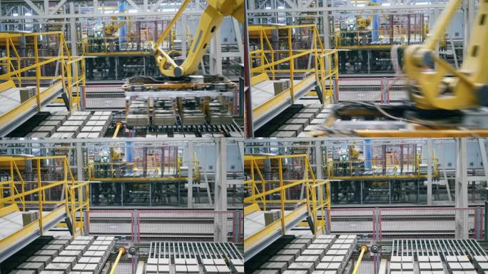 机器人机构，工业机器人正在从输送机上重新放置新制作的砖块。