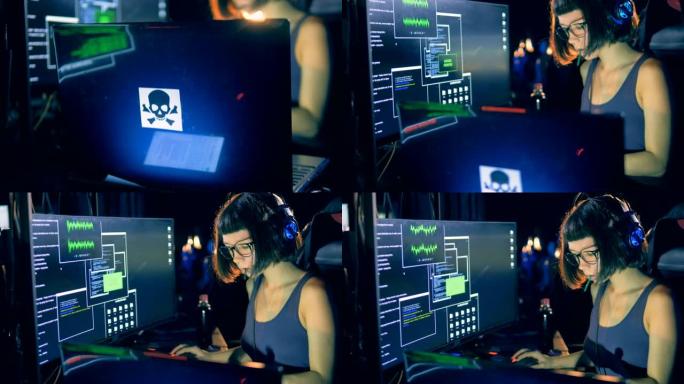 年轻女黑客正在操作电脑