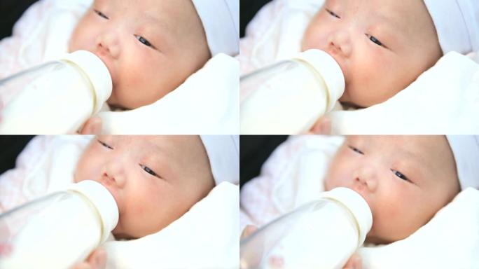 母亲喂养新生婴儿母亲喂养新生婴儿奶瓶奶粉