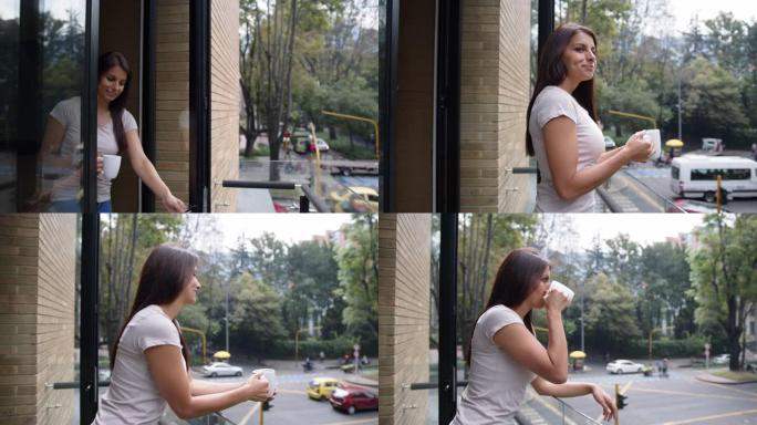 拉丁美洲妇女走到阳台上准备享受阳光明媚的一天并欣赏美景