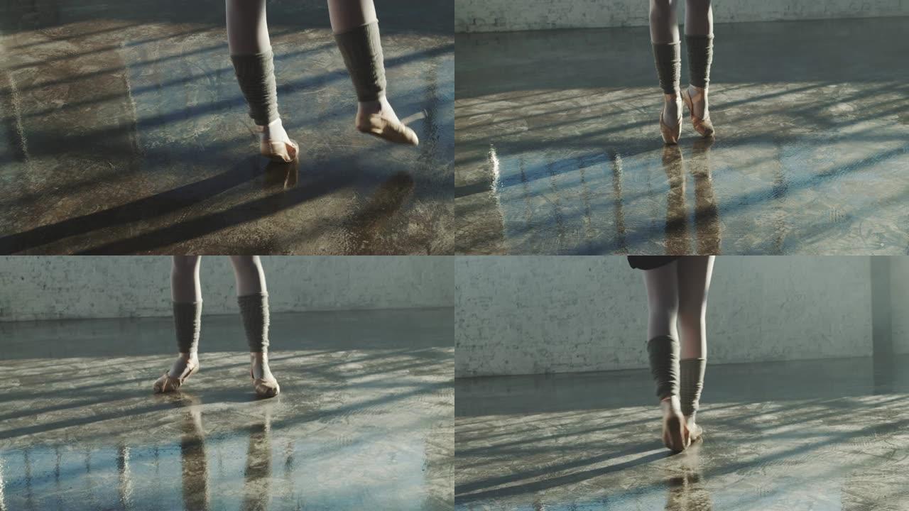 低层芭蕾舞演员在地板上旋转