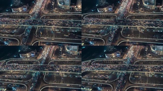夜间立交桥和城市交通的T/L PAN鸟瞰图/中国北京
