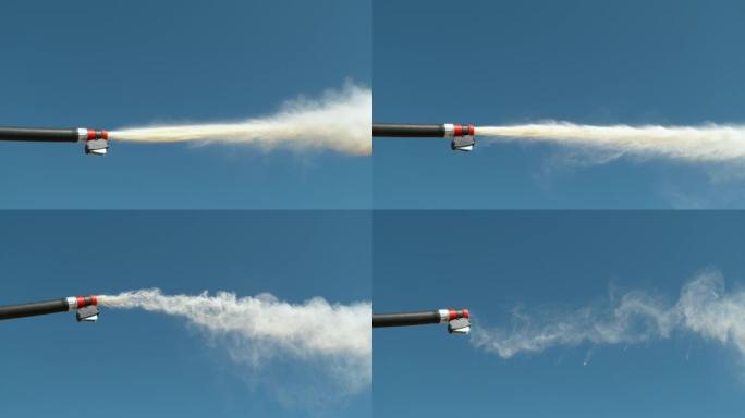 特写镜头，dop: 灭火器喷嘴发出白色粉末的详细镜头。