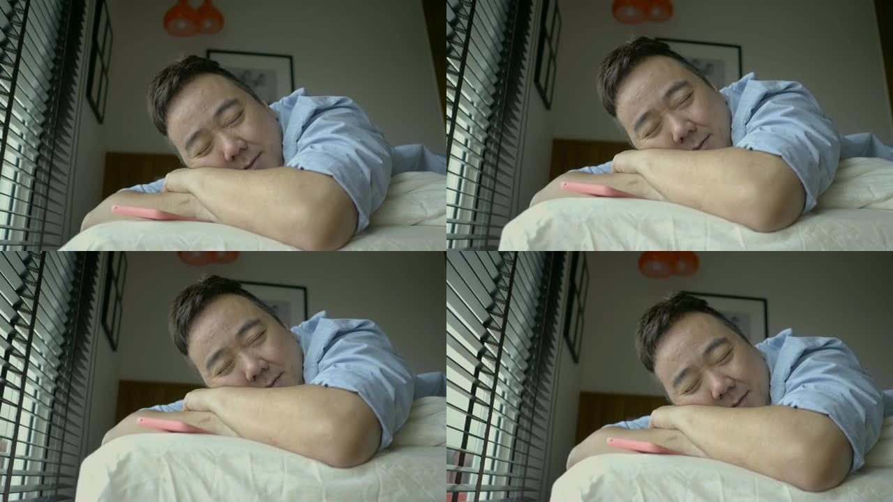 亚洲男子在床上小睡