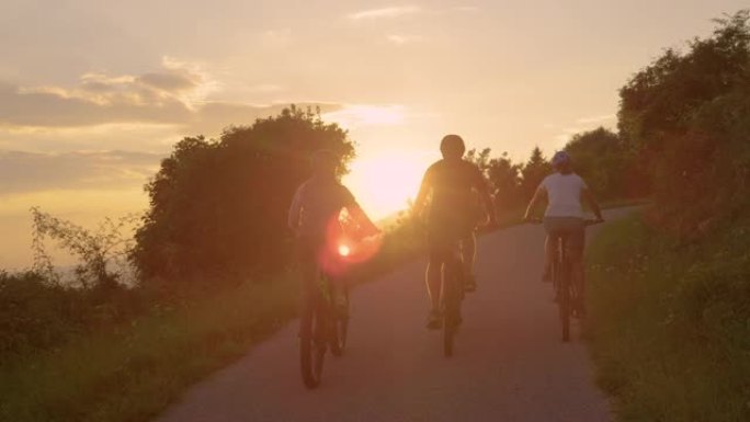 慢动作: 年轻旅行者在阳光明媚的早晨享受风景优美的自行车旅行。