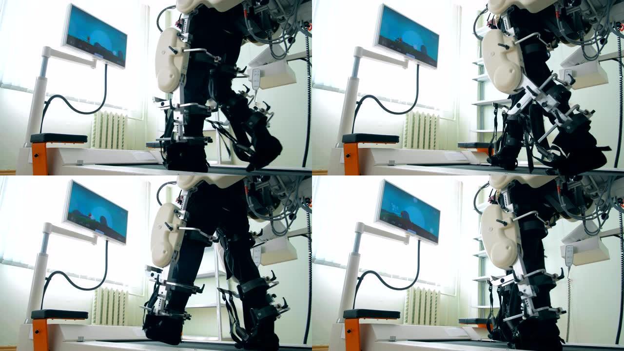 一个身体残障的人的下半身正在模拟机上接受训练。现代医疗恢复装置。
