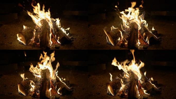木头在火中燃烧的慢动作镜头。燃烧钢坯