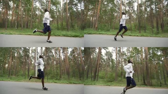 疲惫的黑人男子沿着森林路慢跑