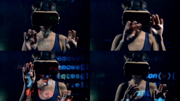 女性黑客在黑客时戴着VR眼镜，特写。