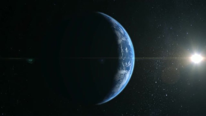 从太空看。地球向左移动。星星闪烁。4K。地球的一小部分被右边的太阳照亮。摄像机飞来飞去。现实的氛围。