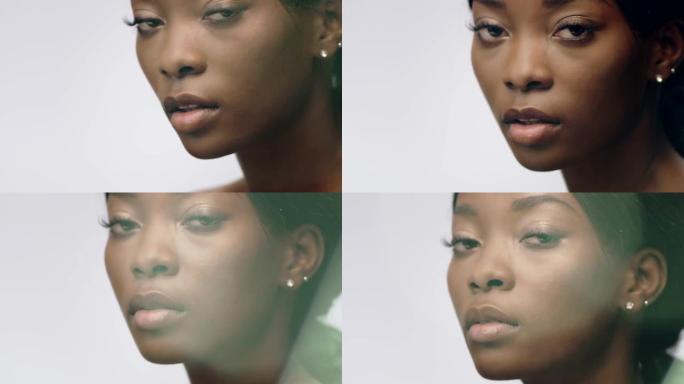 神秘的非洲民族妇女面对皮肤护理。镜头信号弹