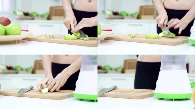 4K UHD: 早上在厨房关闭女人的手，切蔬菜和水果。