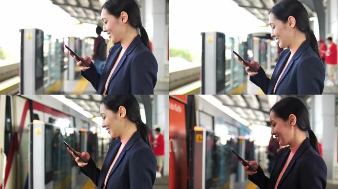 女人在空中火车上使用智能手机