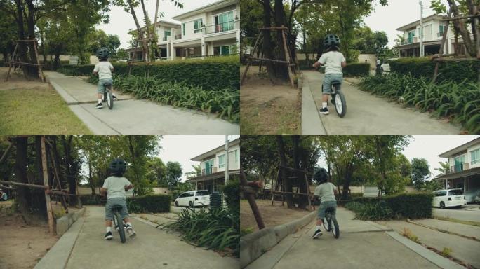 骑自行车的小男孩骑自行车小男孩背影