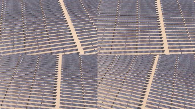 空中: 空路径穿过沙漠深处的太阳能电池板发电厂