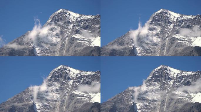 白雪皑皑的山峰的4k时光倒流，天空多云。