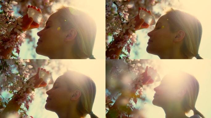 女人的头与樱花树掉落的花瓣上的愈合水晶